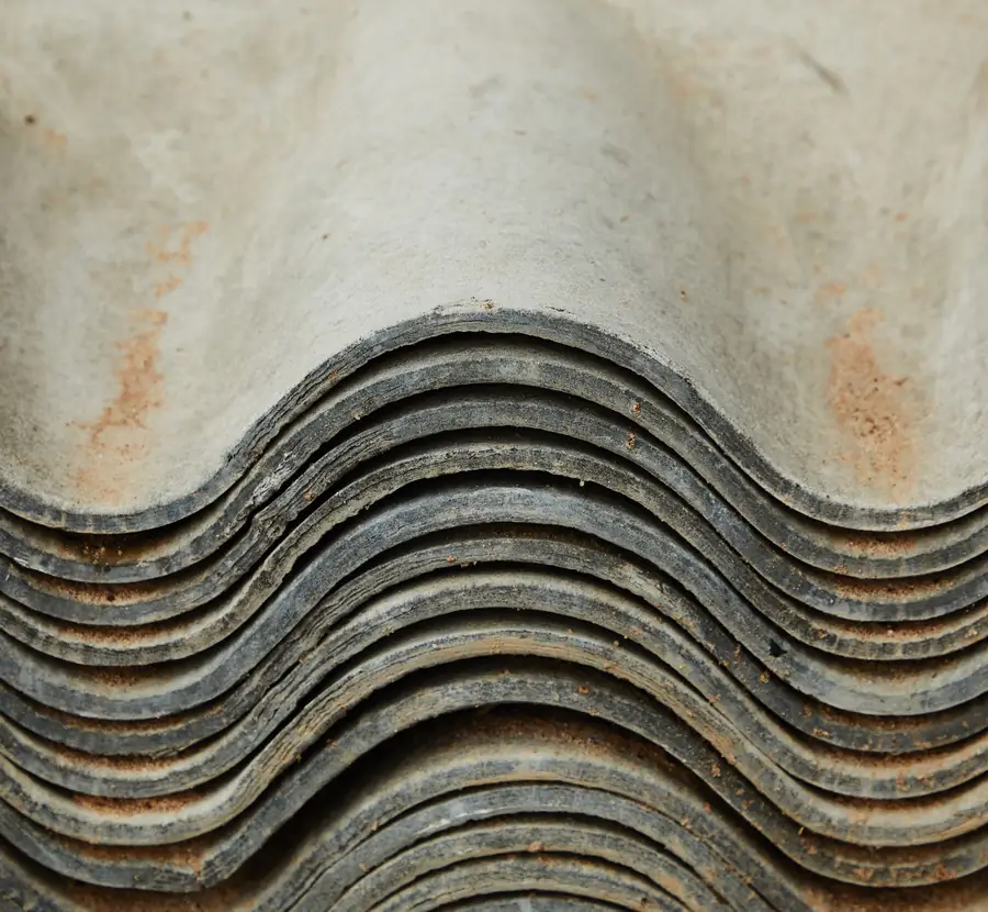 Stack of aged corrugated cement roofing sheets, as found on many older concrete sectional garages around Mansfield