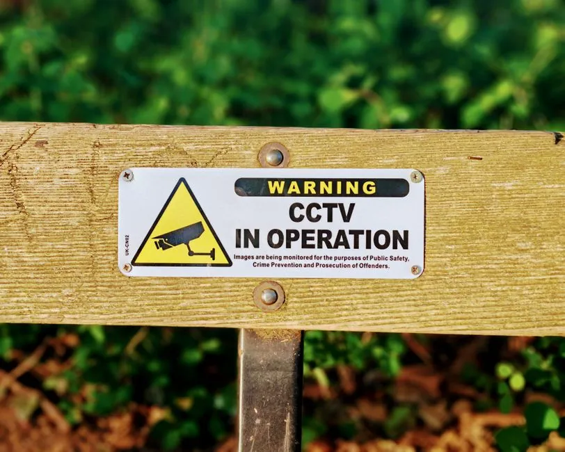 CCTV in operation warning sign of the type used to deter metal theft from roofs in Mansfield