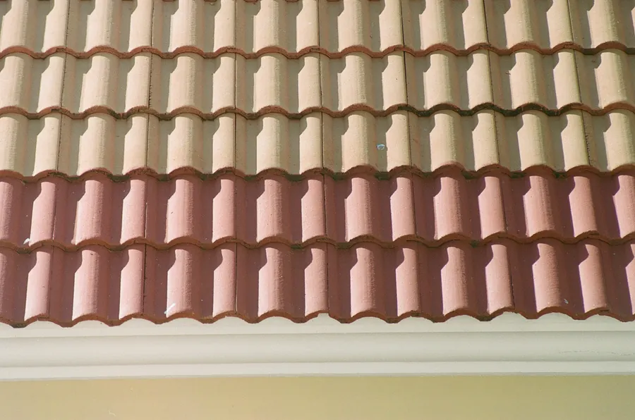 Close view of concrete interlocking roof tiles above a fascia, the covering found on many postwar council houses in Warsop, Shirebrook and Clipstone
