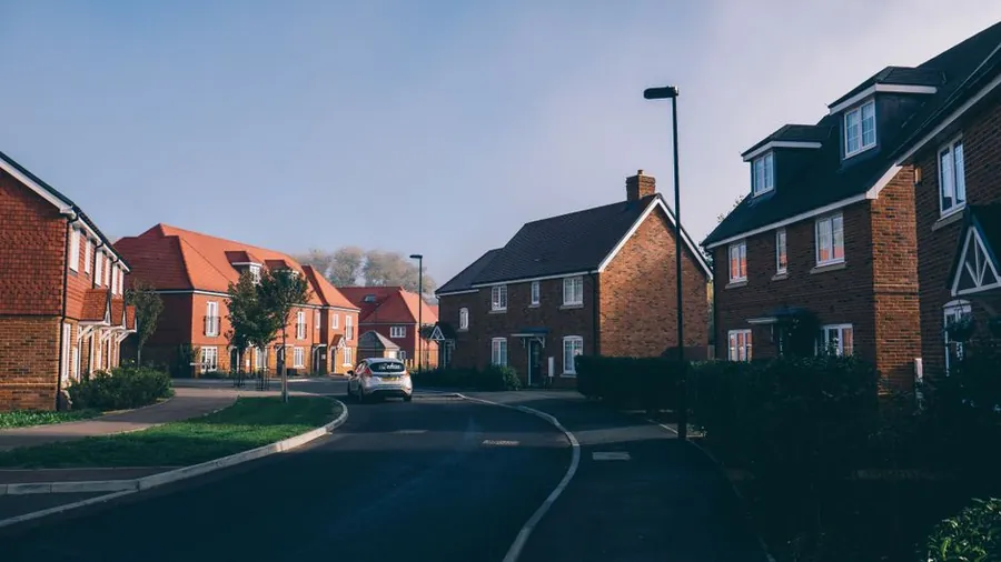 Street of red brick semi detached houses of the kind built by councils across Mansfield
