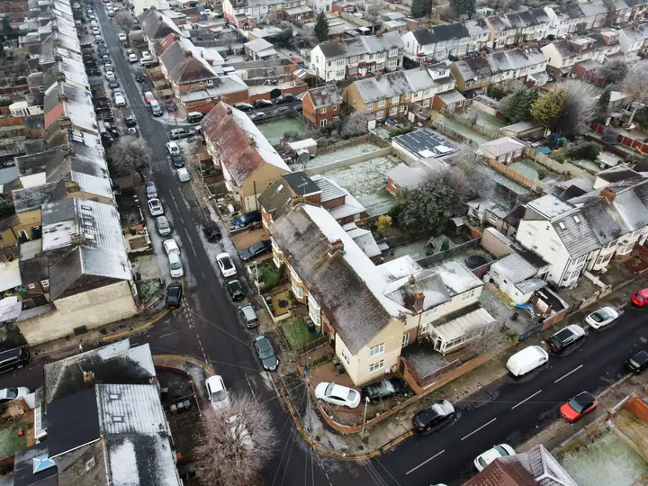 Frost across terraced and semi-detached rooftops, the conditions that stop mortar roof repairs in Mansfield