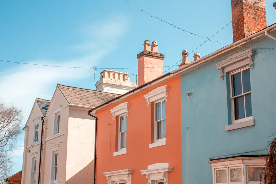 Victorian terraced houses with slate roofs, chimney stacks, black gutters and downpipes, similar to the older terraces around Mansfield town centre