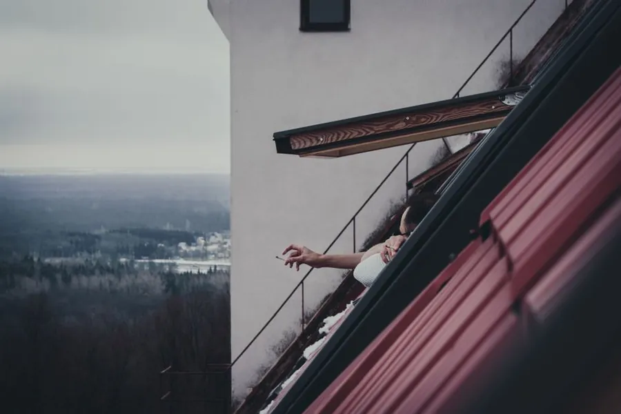 Loft space with daylight at the window during a winter roof space check