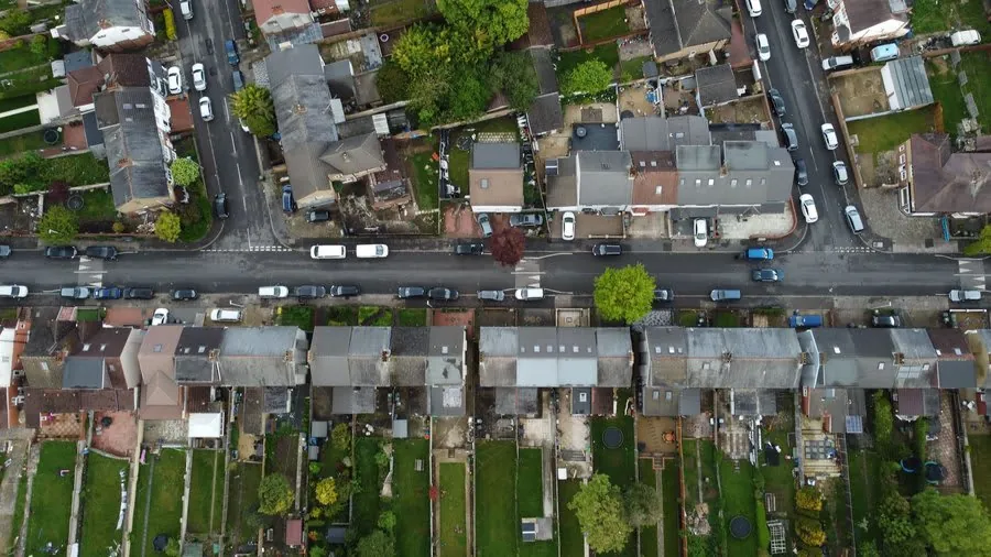 Aerial view of terraced streets whose roofs share the same age and materials