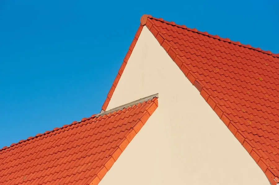 Freshly tiled gable roof on a house after a full roof replacement in the Mansfield area