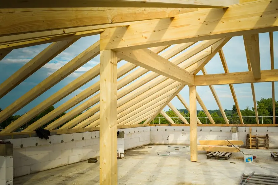 Sound timber roof structure of the kind that outlives several coverings when kept dry