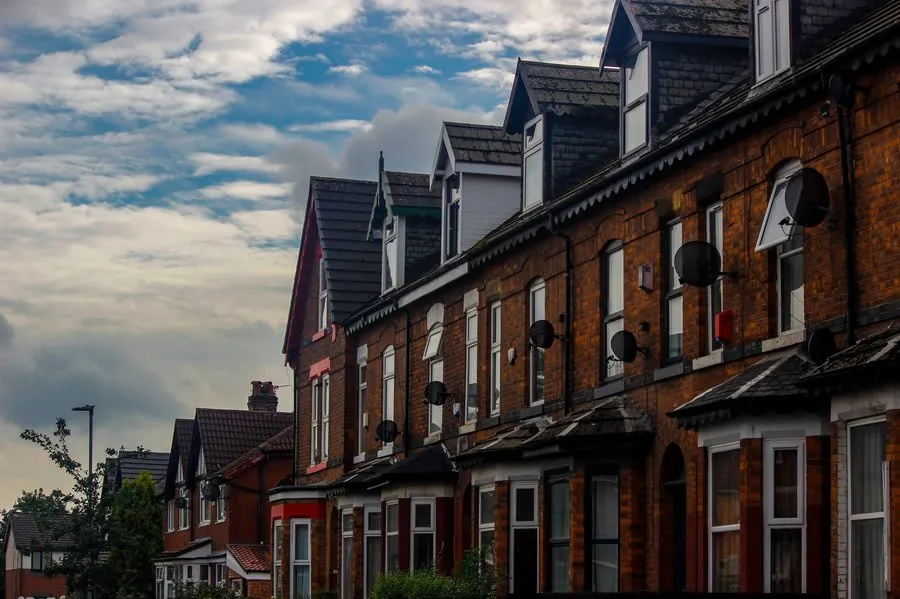 Victorian terraced houses in Mansfield with lead-covered bay window roofs below slate slopes